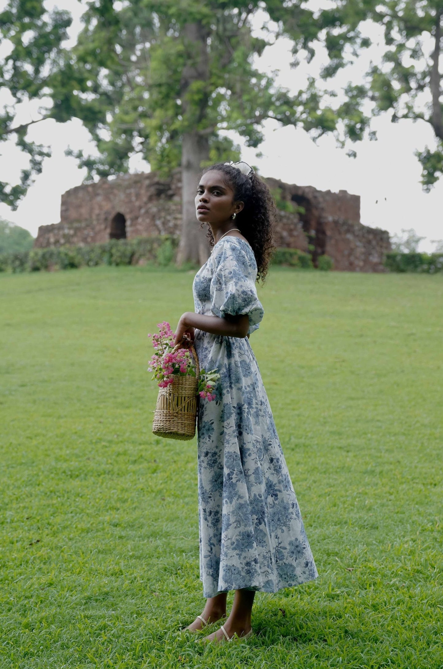 Side picture of floral off shoulder midi dress