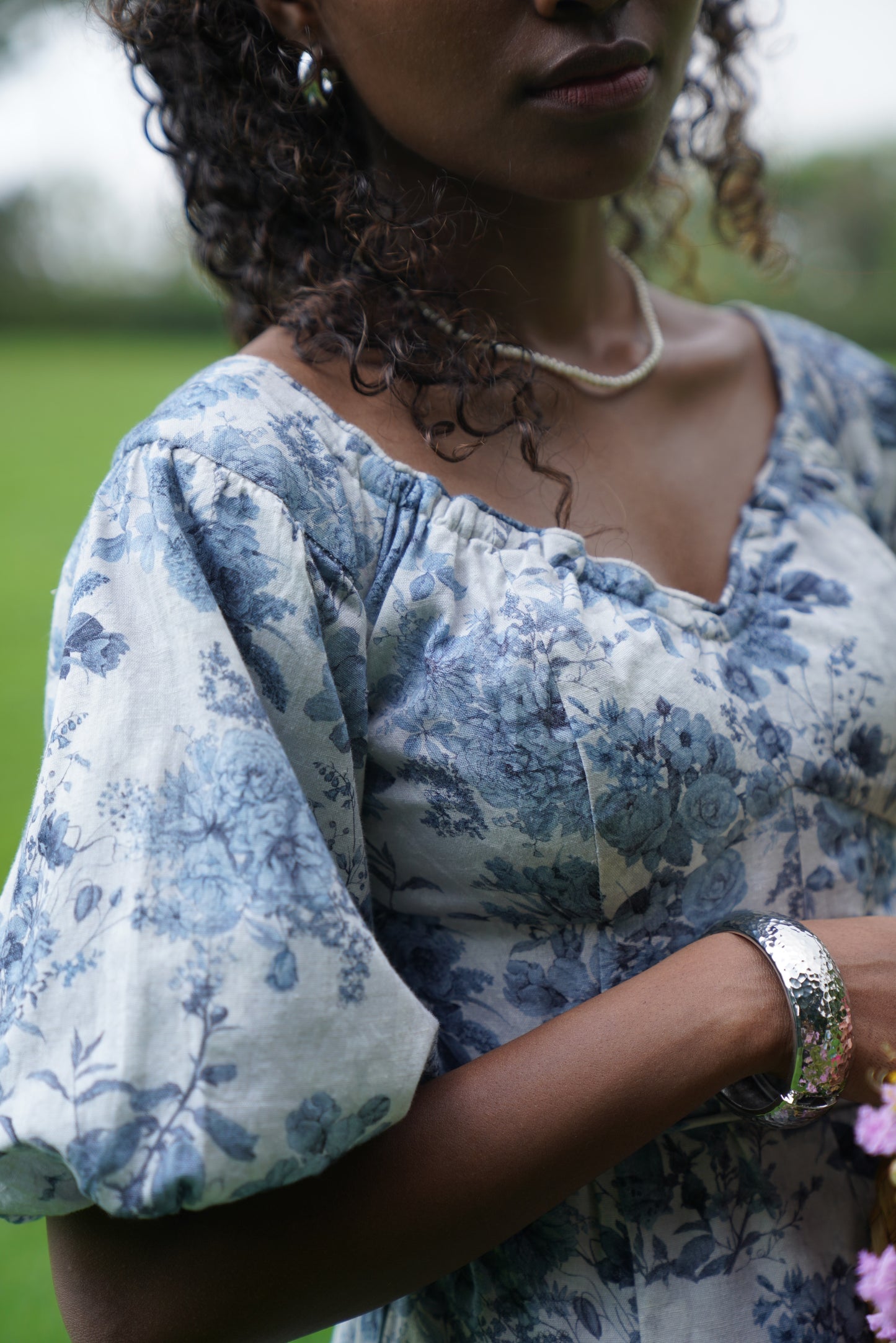 shoulder detail picture of floral off shoulder midi dress