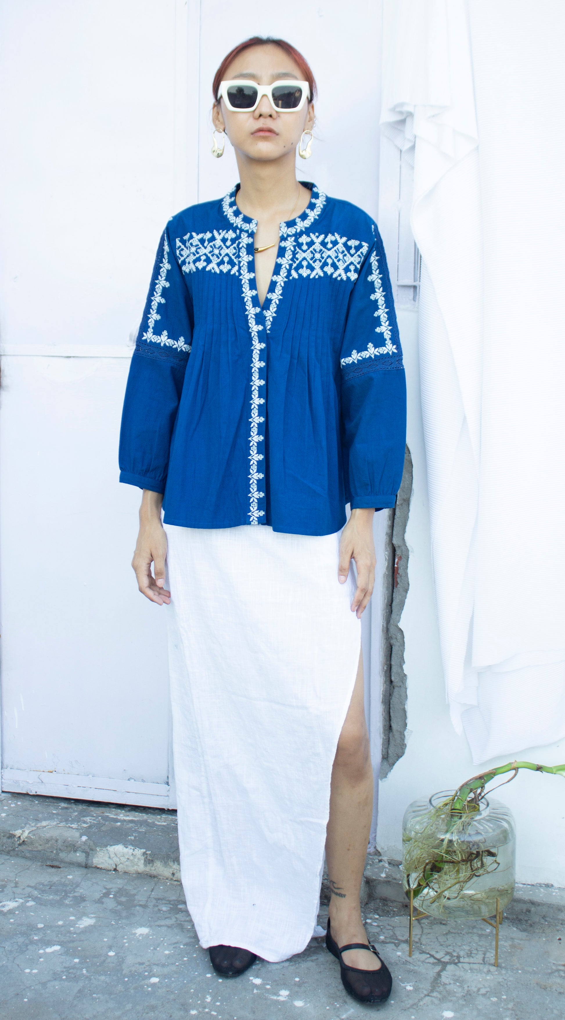 Front picture of blue and white embroidered with skirt