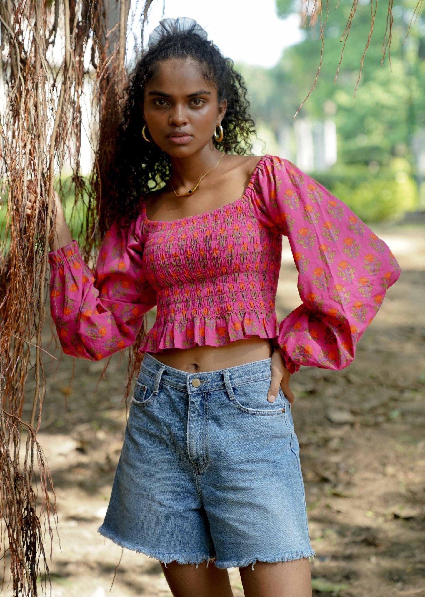 Front picture of pink floral crop top with shorts