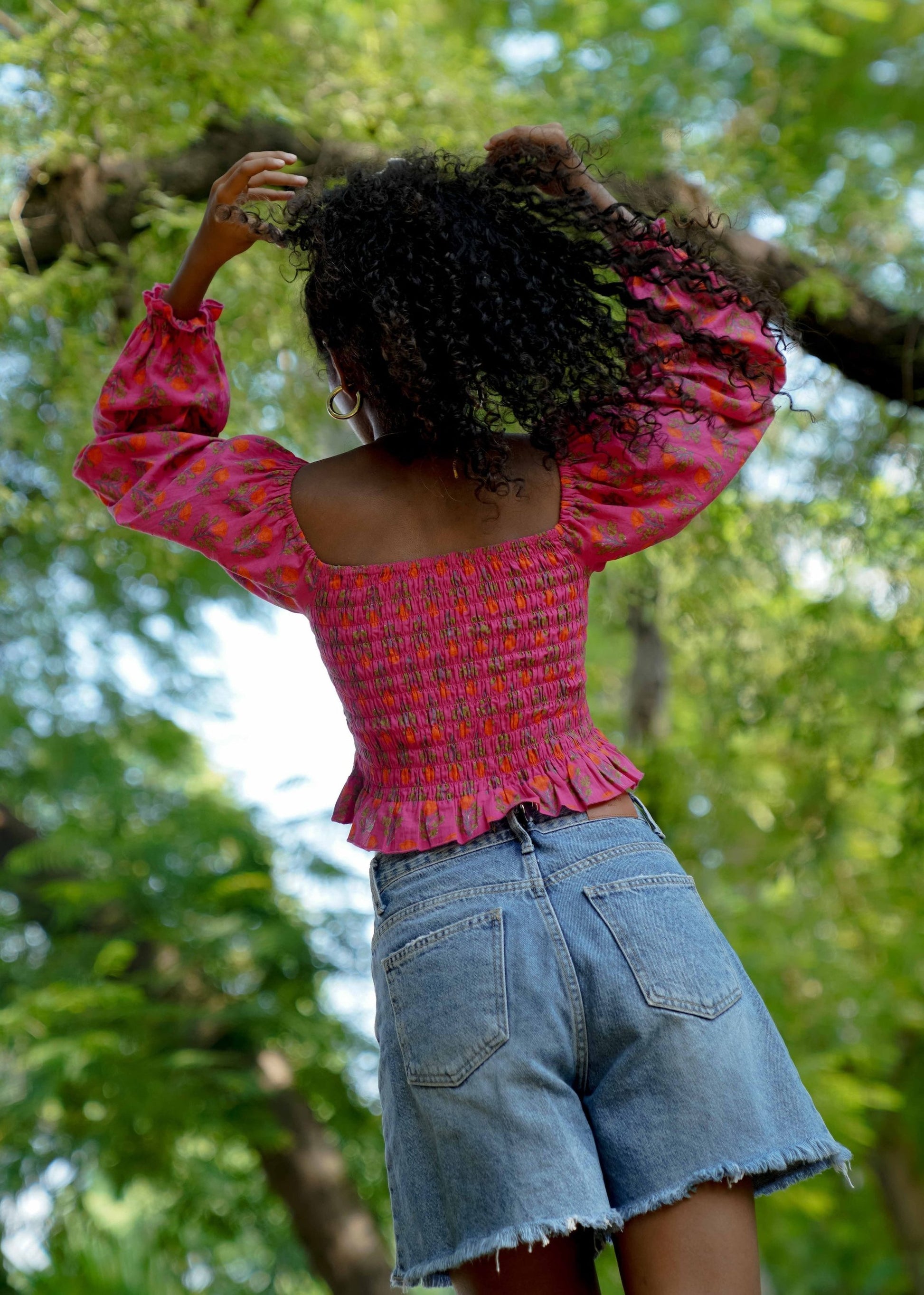 Back picture of pink floral crop top