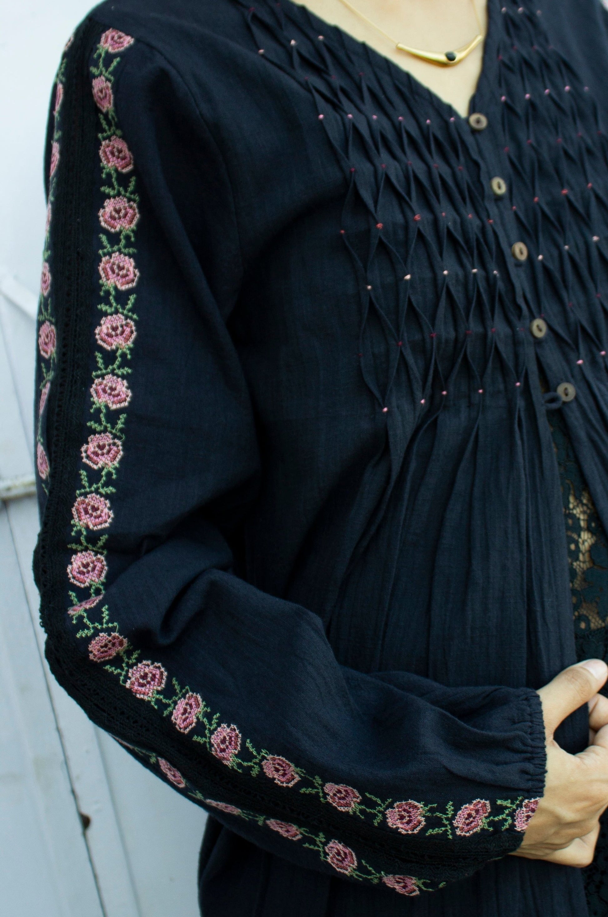 Detail picture of black embroidered top